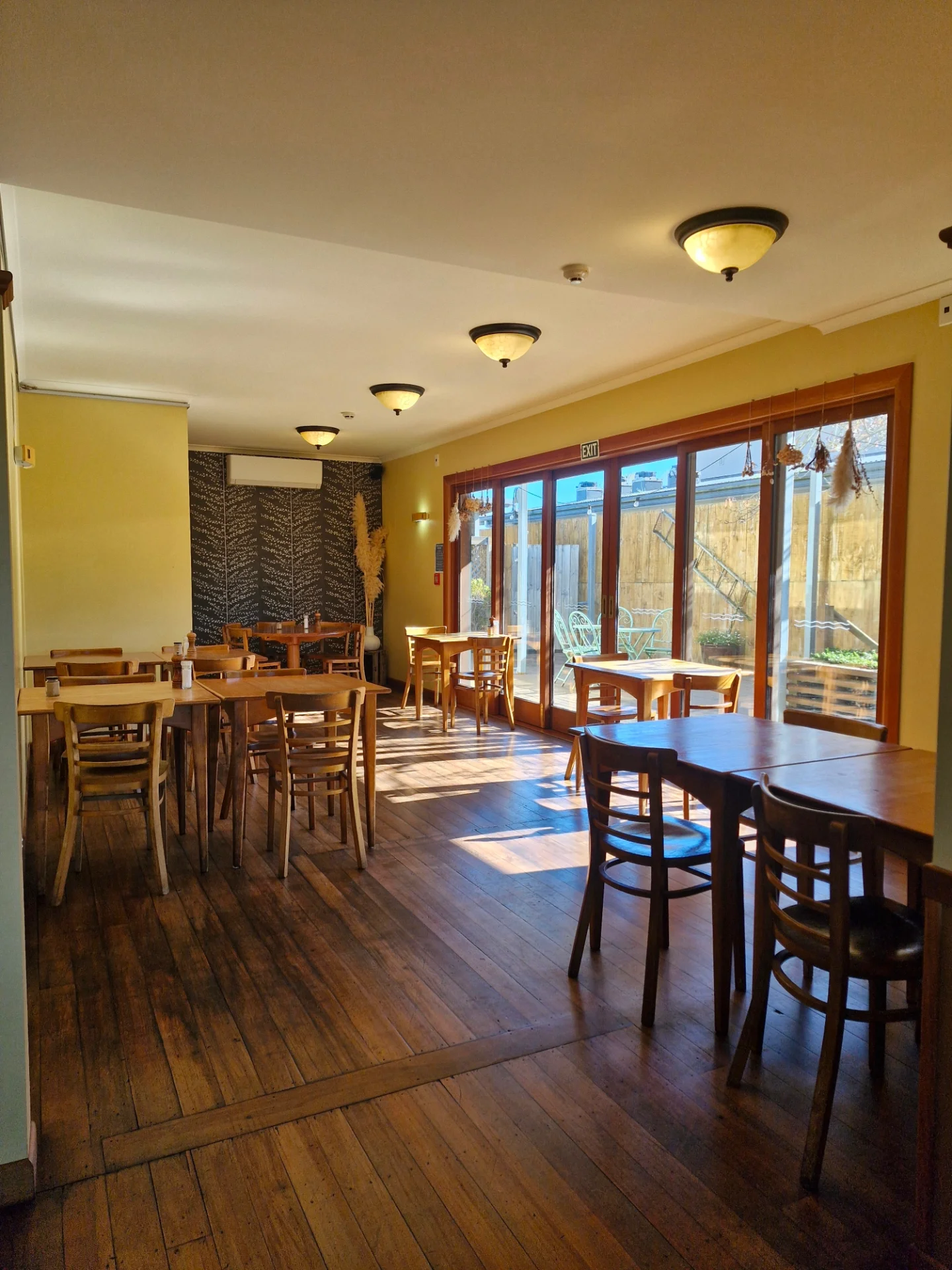 Morning light across the dining room inside Sime's Kitchen